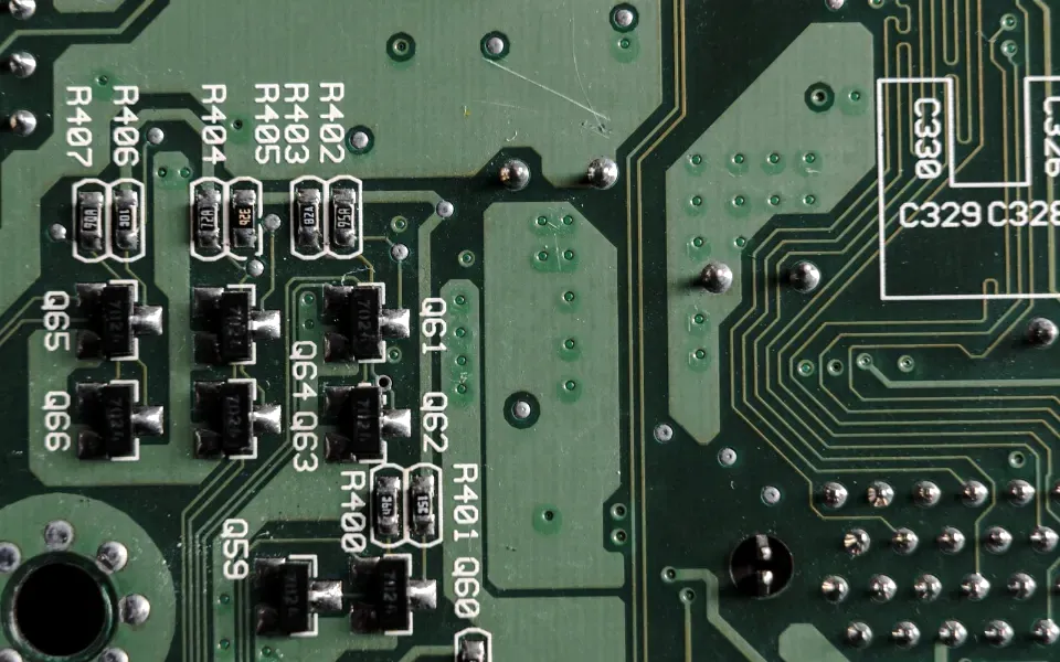 Close-up of a printed circuit board with components and traces