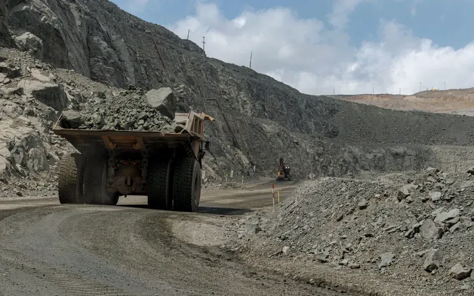 Mining haul truck carrying ore in an open-pit mine